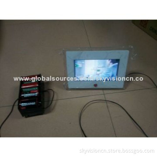 Digital photo frame with battery with front button